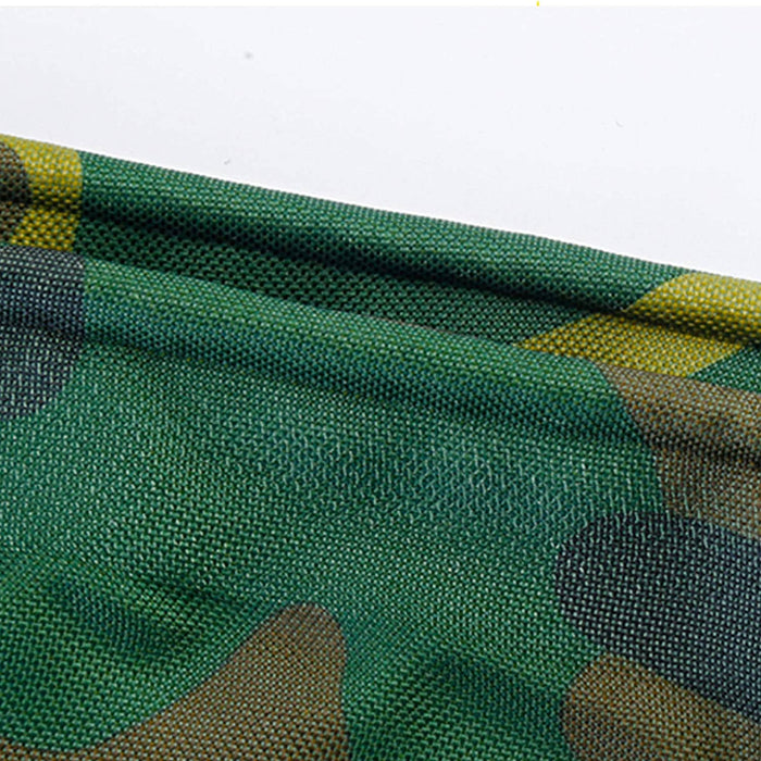 Military camouflage tarpaulin woodland edges