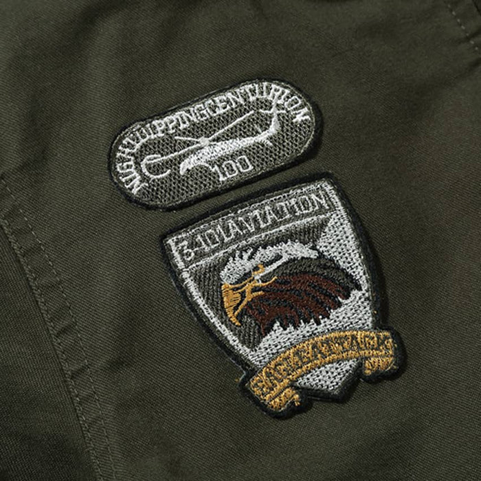 Army green bomber with American patches