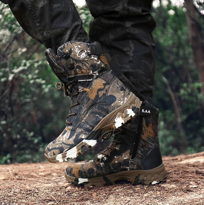 Soldier wearing a pair of military camouflage boots
